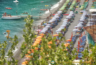 View of the colourful umbrellas on Positano beach