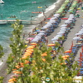 View of the colourful umbrellas on Positano beach