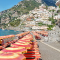 Rows of bright umbrellas on the Spiaggia Grande or the big beach in Positano