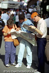 Tourists checking out their maps