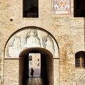 Painting and coat of arms in the Palazzo Comunale courtyard