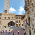 The old Palazzo del Podestà with the very tall Torre Rognosa on Piazza Duomo