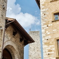 View of Antony Gormley's man on the San Gimignano tower