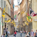 Street decorated with palio flags