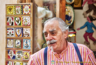 A distinguish-looking Siena shopkeeper