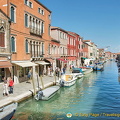 Murano's Canal Grande, lined with shops on both sides