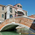 Like in Venice, many little bridges criss-cross the canal in Murano