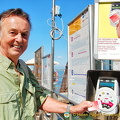 Tony validating his vaporetto ticket before boarding the boat