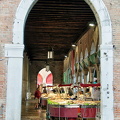 View of seafood market through an entrance arch