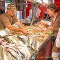 An early shopper at the fish market