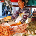 Fish seller in action