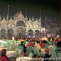 Crowds enjoying drinks and music in Piazza San Marco