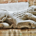 Lion bearing a snake over the entrance of Chiesa San Polo