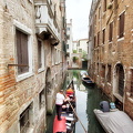 A goods carrying gondola in the back canals of Venice