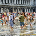 Tourist having a bit of fun in the flood water