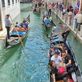 The gondola business goes on as long as the boats are able to make it under the bridges