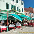 Me, checking out the busy Trattoria Da Roma