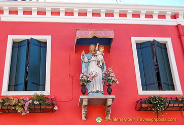Altars like this decorate many of the buildings in Burano