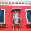 Altars like this decorate many of the buildings in Burano