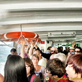 Riding the very crowded vaporetto to Burano