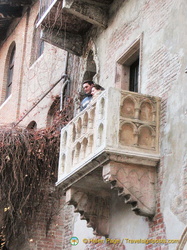 Young couple having their Romeo and Juliet moment on Juliet's Balcony
