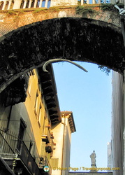 Arco della Costa with its whale rib bone. This passageway links the Domus Nova with the Palazzo della Ragione.