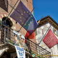 EU flag and the 'scala' emblem of the Scaligeri