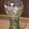The roemer, an ovoid tumbler reminiscent of our current wine glasses, was fashionable during the 16th century. The stem is decorated with raspberry-shaped prunts.
