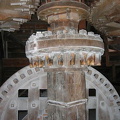 Rotating cog operates an adjacent wheel to transmit power