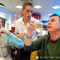 Discussing soccer with the waiter