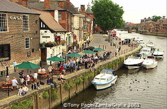 You can enjoy a beer and a meal overlooking the river
