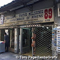 Stavros Melissinos the poet in his sandal shop, Plaka, Athens