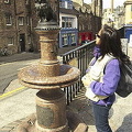 Greyfriars Bobby - a little Skye terrier sitting on an old drinking fountain near the gateway to Greyfriars Church [Greyfriars
