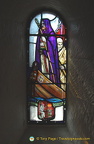 Stained glass window depicting St Columba