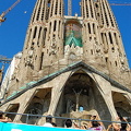 A tourist bus going past the Sagrada Familia