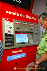 The bright red metro ticket vending machine