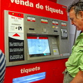 The bright red metro ticket vending machine