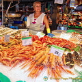 This stall sells cooked prawns and shellfish