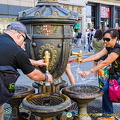 Getting drinking water from the Font de Canaletes