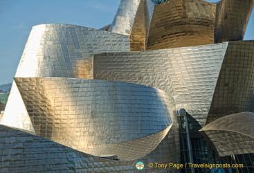 Guggenheim Bilbao titanium panels catching light from different angles