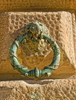Palace of Charles V:  A decorative doorknock