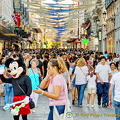 A very busy shopping street off the Puerta del Sol