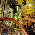 The faithful touching the orb of the Black Madonna