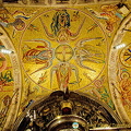 Mosaics showing the Black Madonna being proclaimed patron saint of Catalonia and other religion scenes.