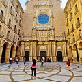 The facade of Montserrat Basilica and the inner courtyard