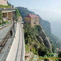 The building on the cliffside is the cable car station