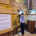 Looking at the place where visitors can kiss the Holy Pillar