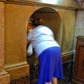 A faithful kissing the Holy Pilar