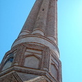 The fluted minaret's red bricks were once decorated with turquoise tiles