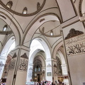 Calligraphy on the pillars in the prayer hall describe the attributes of Allah